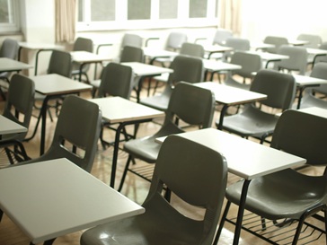Classroom of Empty Desks Photo by <a href="https://unsplash.com/@mclee?utm_source=unsplash&utm_medium=referral&utm_content=creditCopyText">MChe Lee</a> on <a href="https://unsplash.com/photos/white-table-with-black-chairs-PC91Jm1DlWA?utm_source=unsplash&utm_medium=referral&utm_content=creditCopyText">Unsplash</a>